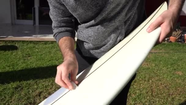 Surfer Home Preparing Board — Video