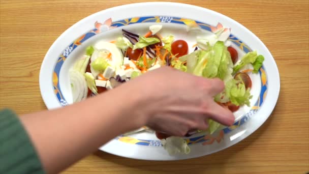 Woman Putting Lettuce Tray Salad Slow Motion — Wideo stockowe