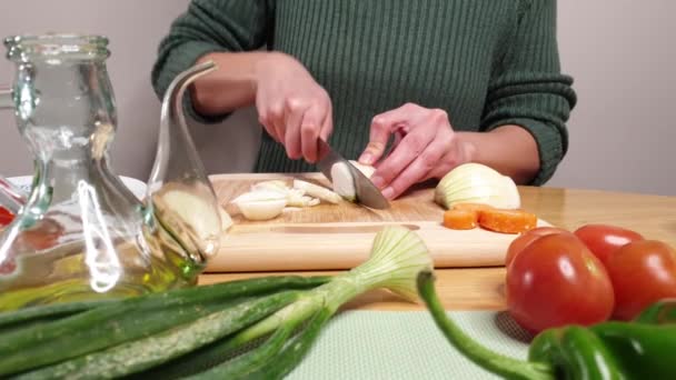 Woman Cutting Onion Table Decorated Healthy Food — Stockvideo