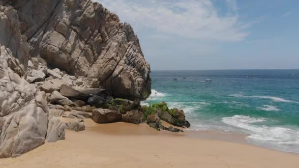 Panning View Rock Formation Alongside Beach Ocean — Stock video