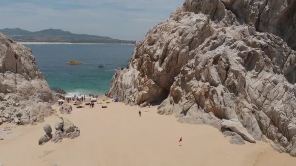 Aerial View Beach Panning Out Ocean Amidst Rock Formations — Stok video