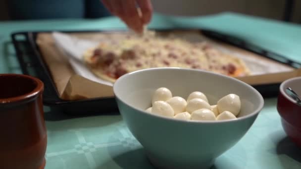 Selective Focus Hand Putting Cheese Homemade Pizza Motzarella Dumplings Bowl — Stockvideo