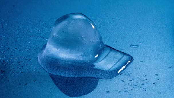 Ice Cube Melting Time Lapse Cold Blue Background — Video