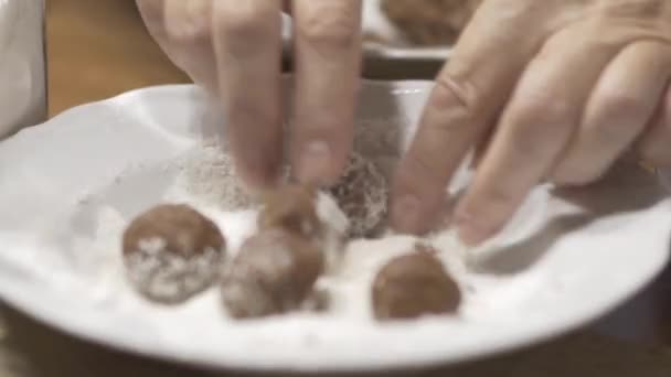 Woman Hand Rolling Chocolate Balls Desiccated Coconut White Plate Close — 비디오