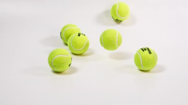 Slow Motion Tennis Balls Falling Rolling Camera — Video Stock