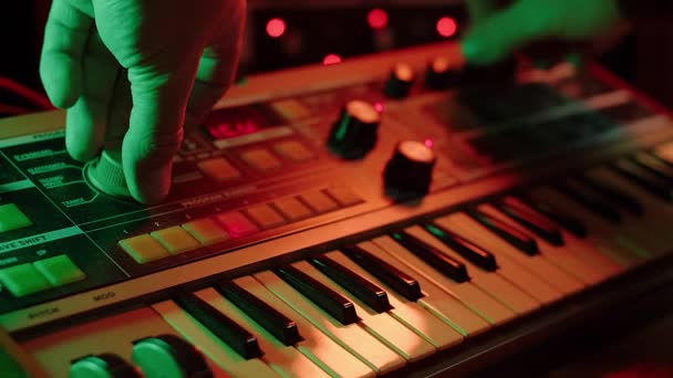 Slow Motion Shot Man Playing Keys Turning Knobs Vintage Synth — Stock Video