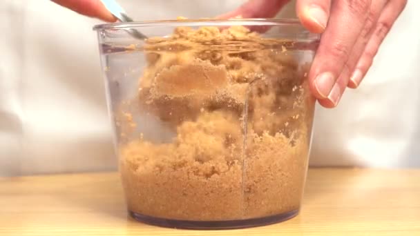 Stirring Crushed Biscuits Prepare Cake Base Bowl Metal Spoon — ストック動画