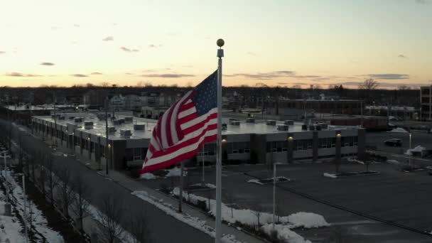 Orbiting American Flag Waving Wind Sunset Parallax Aerial View — Vídeo de stock