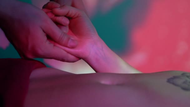 Physiotherapist Performing Massage Patient Hand Spa Ambient Light Create Atmosphere — Stockvideo