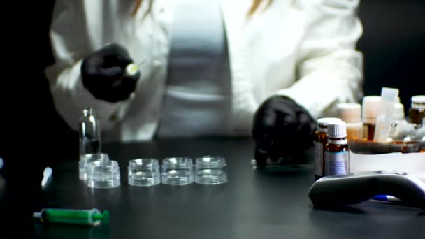Doctor Black Gloves Taking Vaccine Syringe Vial Pills Table — 图库视频影像