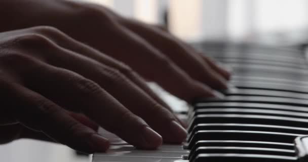 Piano Keyboard Extreme Close Hands Backlit Background Natural Color Selective — 图库视频影像