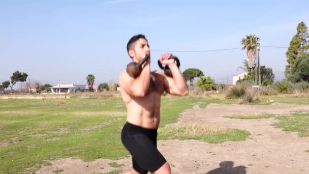 Functional Training Kettlebell Outdoors Bare Chested — Stock video