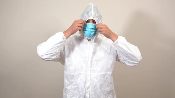 Doctor Protective Suit Ppe Opening Suit Taking Mask Smile — Wideo stockowe