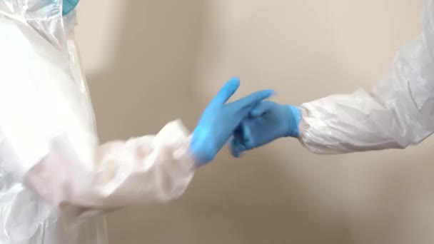 Doctors Protective Suit Ppe Making Friendly Salute Fists — Stok video