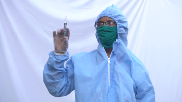 Doctor Ppe Kit Blue Protective Suit Surgical Mask Latex Gloves — Stockvideo