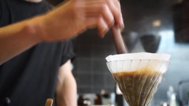 Cinemagraph Specialty Coffee Barista Brewing V60 Filter Coffee Stirring Wooden — Stockvideo