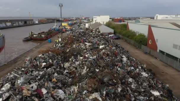 Forward Aerial Drone Footage Heap Metal Recycling Dockside — Stockvideo