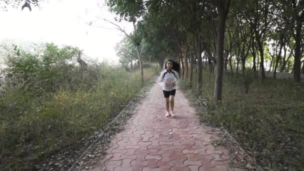 Woman Jogging Outdoors Slow Motion Video — Vídeo de stock