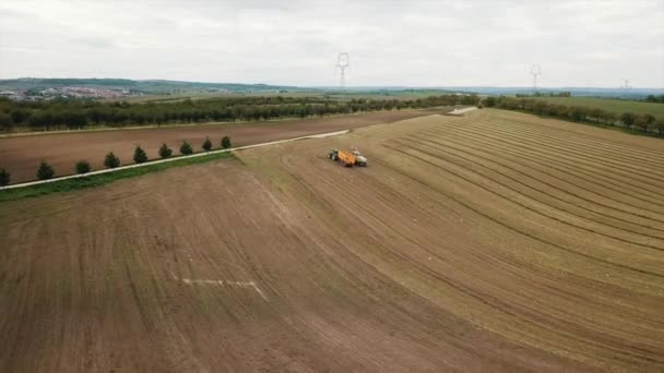 Bird Eye View Farm Trucks Park Bare Field — Vídeo de Stock