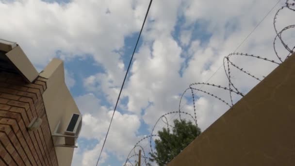 Time Lapse Barbed Wire Air Conditioning Unit Clouds — 图库视频影像