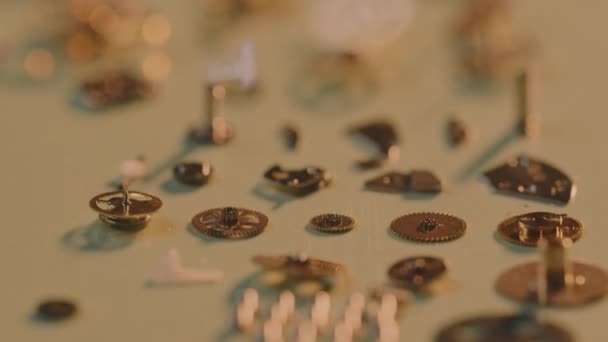 Macro Intricate Parts Gold Watch Lying Flat Surface Close — Stockvideo