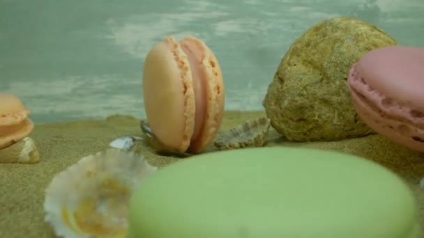 Pastel Colored Macarons Sand Decorated Sea Shells Macarons Beach Concept — Stockvideo