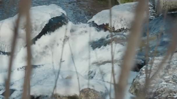 Flowing Frozen River Water Foam Medium Shot Slow Motion — Stockvideo