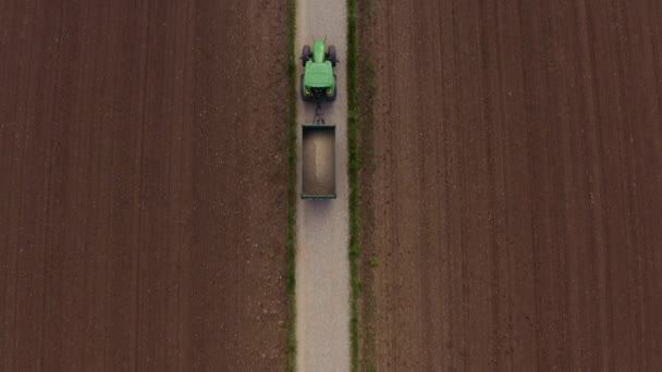 Top Drone Shot Driving Tracor Trailer Framed Fields Brown Earth — Video