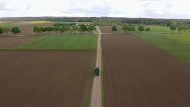 Fly Tractor Which Driving Argicultural Countryside Fields Rural Landscape Filmed — Video