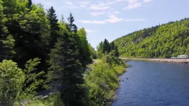 Drone Flies Highway Vehicles Lake Surrounded Forest Day Ontario Canada — Stock videók