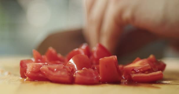 Out Focus Scene Young Guy Cutting Tomatoes Wooden Table Kitchen — 비디오