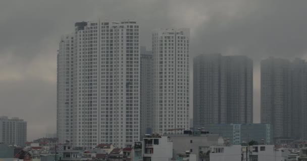 Atmospheric Panning Shot Large High Rise Apartment Buildings Morning Fog — стоковое видео