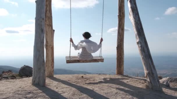 Back View Woman Wooden Swing Enjoying View Top Folgosinho Mount — kuvapankkivideo