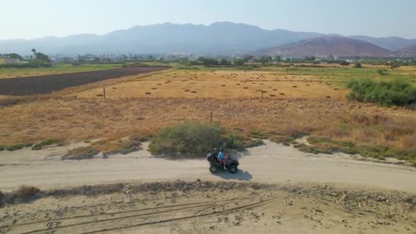 Side Aerial View Atv Driving Greek Countryside — Vídeos de Stock