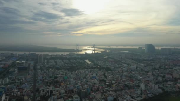 Fly Urban Area River Large Modern Suspension Bridge Early Morning — Stockvideo