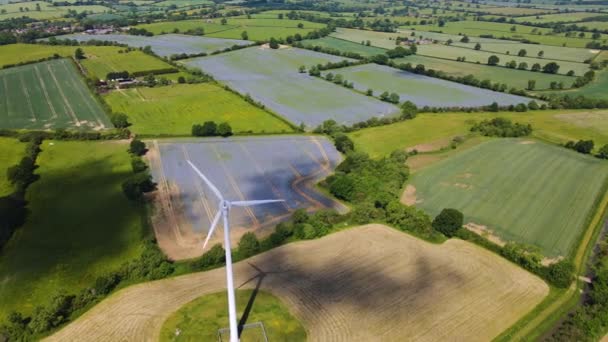 Drone Footage Wind Turbine Generating Clean Renewable Energy Amongst Farm — 图库视频影像