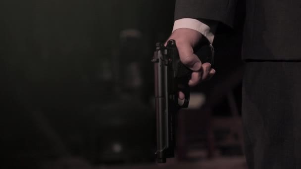 Secret Agent Mafia Black Suit Holding Pistol Torso Raising Gun — Stock Video