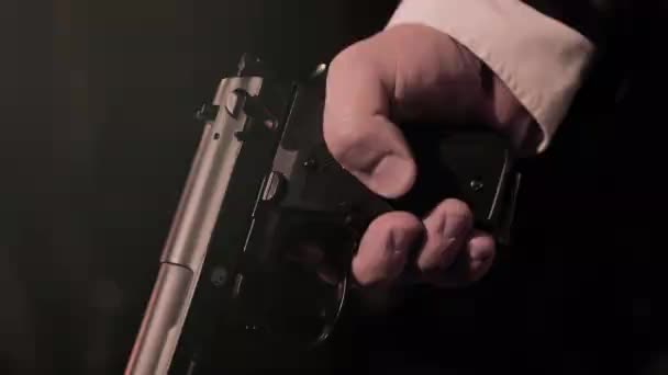 Close Mafia Man Suit Hands Holding Pistol Dark Background — Videoclip de stoc