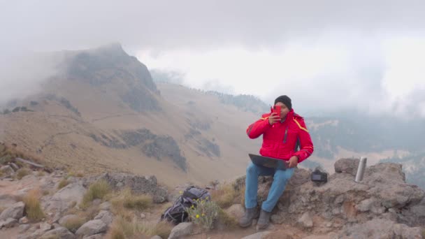 Young Latin Man Working Laptop Computer Rock Mountain Scenic View — Video