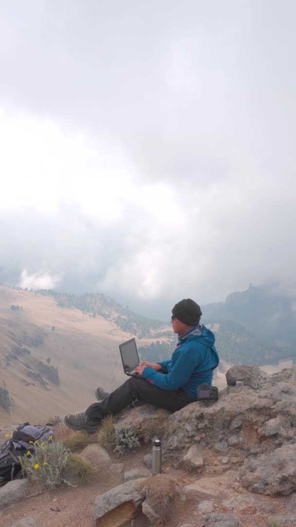 Digital Nomad Young Latin Man Working His Laptop Sitting Rock — Vídeo de Stock