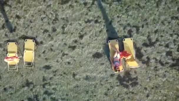 Woman Lying Sun Lounger Top View Drone Aerial View — Vídeos de Stock