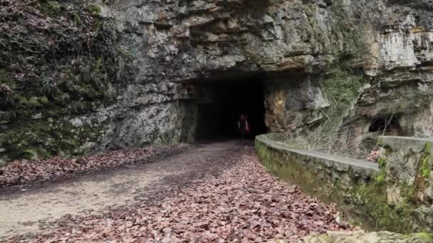 Single Male Backpacker Walking Out Mountain Tunnel Hiking Path Outdoors — Stok video