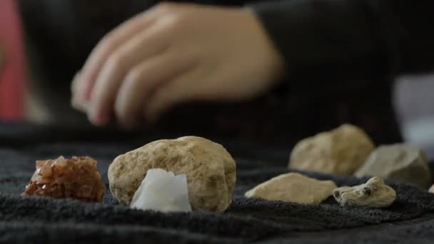 Kid Arranges His Rock Collection Towel Makes Them Circle — Vídeo de Stock