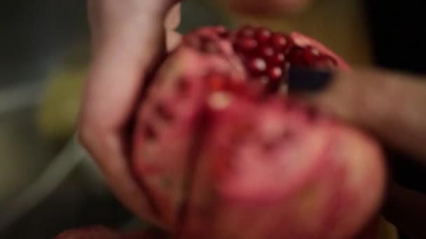 Peeling Pomegranate Opening Showing Red Seed — Stock Video