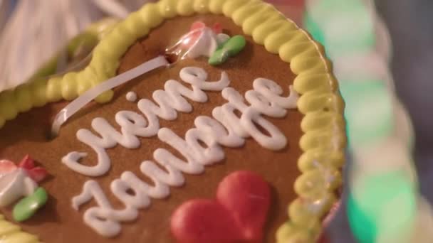 German Cute Gingerbread Heart Flashing Bokeh Background — Stock video