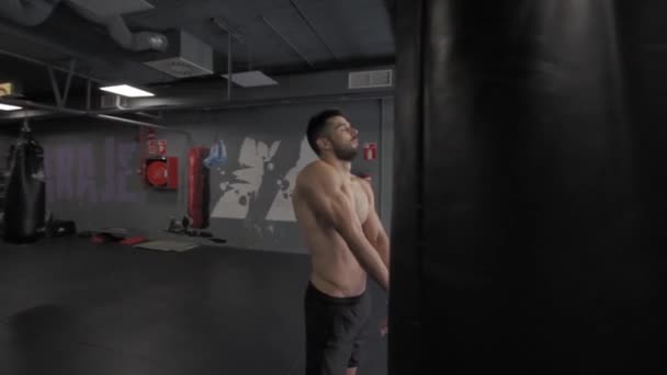 Young Athletic Man Stretching Arms Doing Exercise Gym — Video