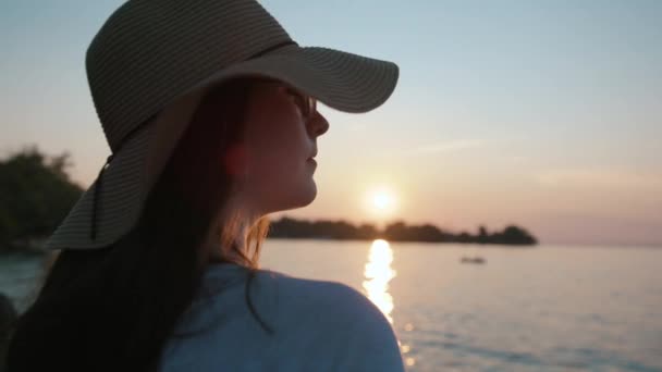 Girl Sunhat Looking Out Water Sunset — Stockvideo