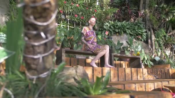 Female Model Sits Meditatively Tropical Garden Warm Summer Day — Vídeos de Stock