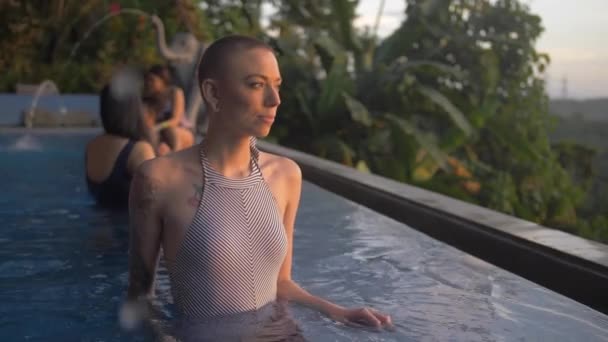 Gorgeous Female Tourist Contemplatively Poses Tropical Resort Pool Summer — Vídeos de Stock