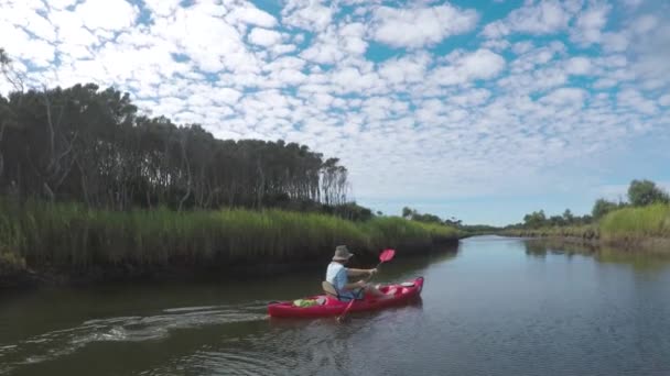 Slow Motion Shot Man Paddling River Red Kayak — Stockvideo